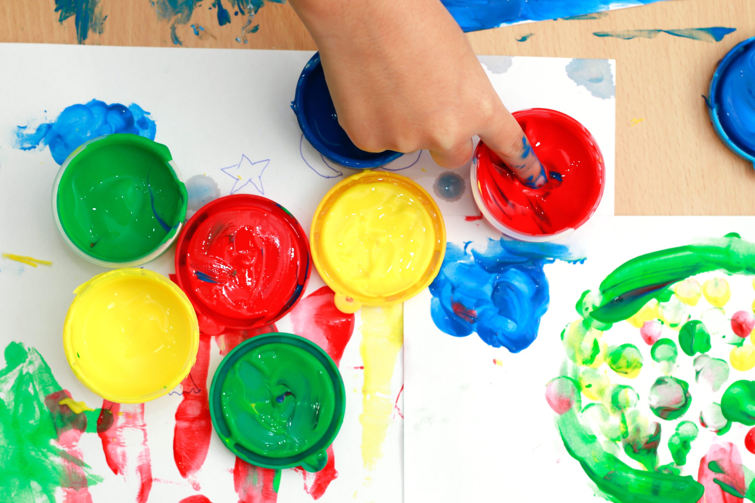 colorful finger paints on a table Counselling and Psychotherapy services in Antrim - NI Counselling