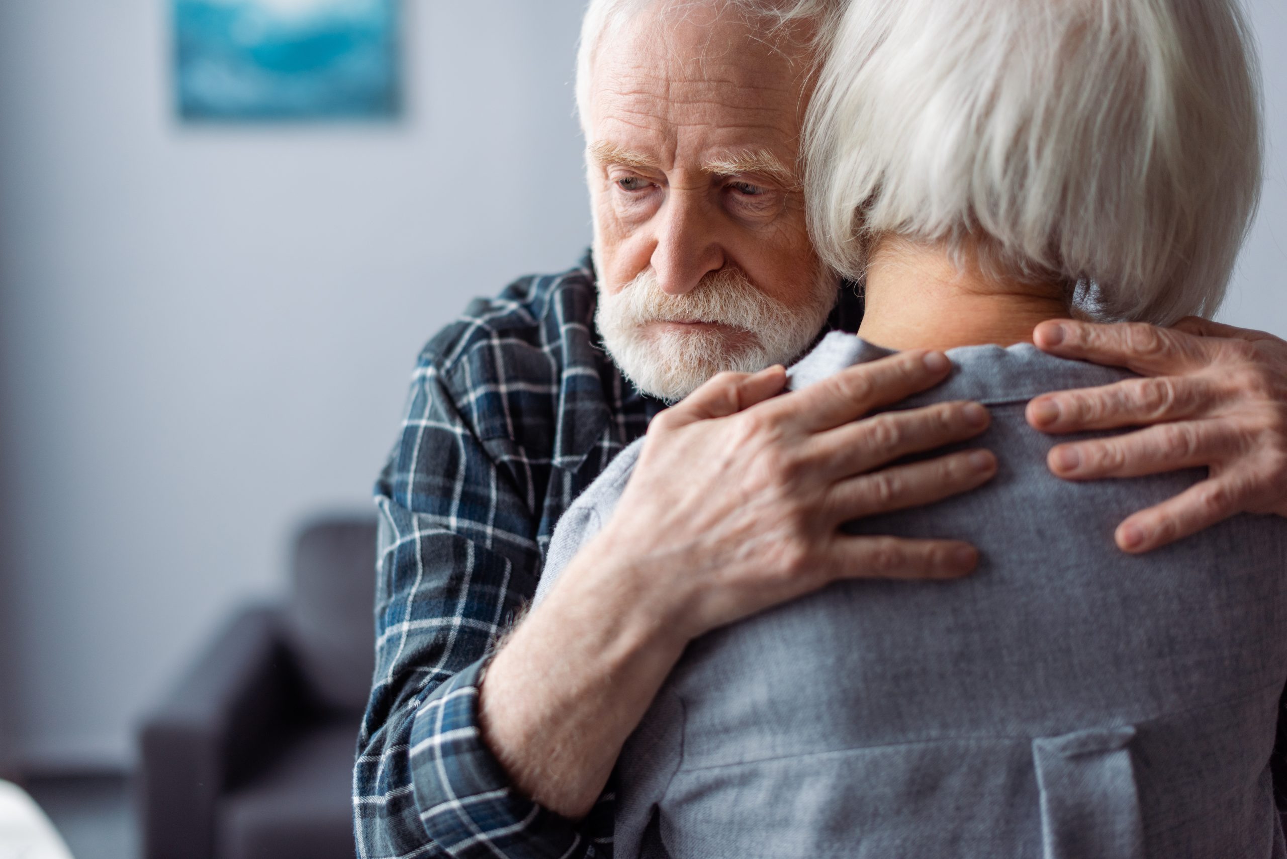 Back,View,Of,Senior,Woman,Hugged,By,Husband,,Sick,On Alzheimer's and Dementia